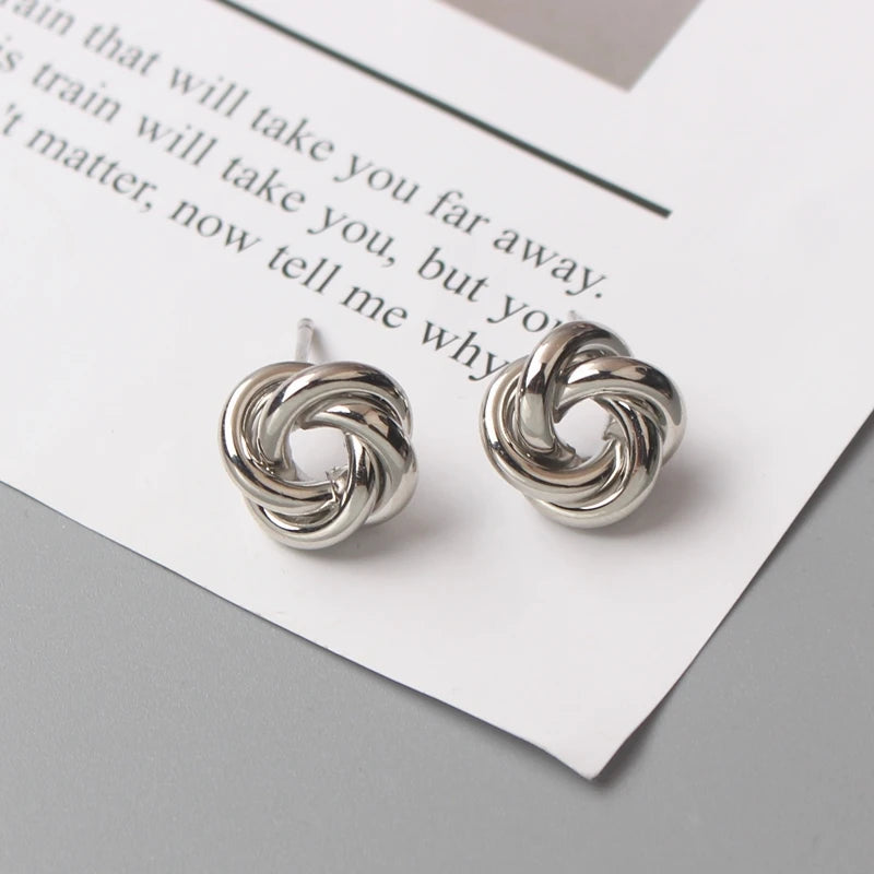 Boucles d'oreilles à tige pour femmes, style rock, lisse, petit nœud en métal torsadé, fleur