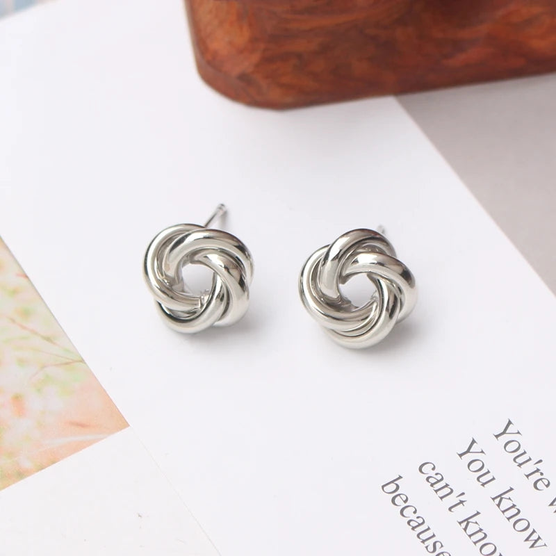 Boucles d'oreilles à tige pour femmes, style rock, lisse, petit nœud en métal torsadé, fleur