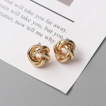 Boucles d'oreilles à tige pour femmes, style rock, lisse, petit nœud en métal torsadé, fleur
