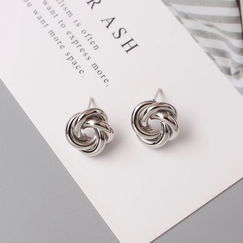Boucles d'oreilles à tige pour femmes, style rock, lisse, petit nœud en métal torsadé, fleur